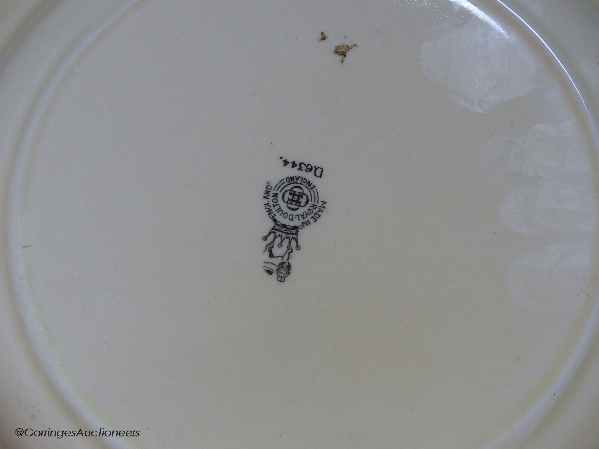 A Royal Doulton 'Burns' plate, no.D6344, diameter 26cm, and a George Jones & Sons Abbey pattern blue and white bowl